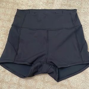 Lululemon In Movement high rise 4inch shorts. Barely worn.